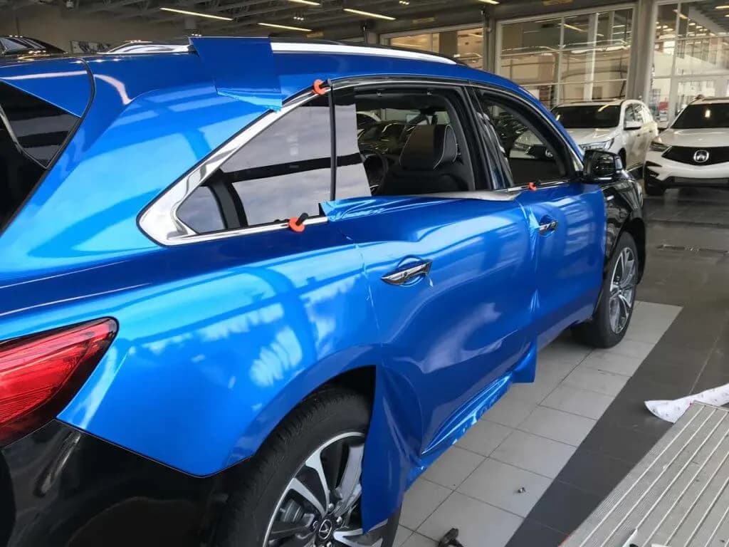 Full blue wrap on Acura MDX