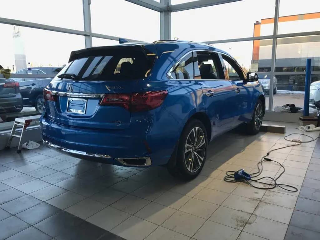 Full blue wrap on Acura MDX